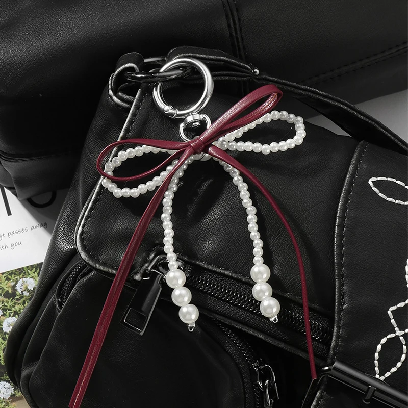 Słodki breloczek z perłą w ksz – Ribbon Bow Gift recenzja i cena