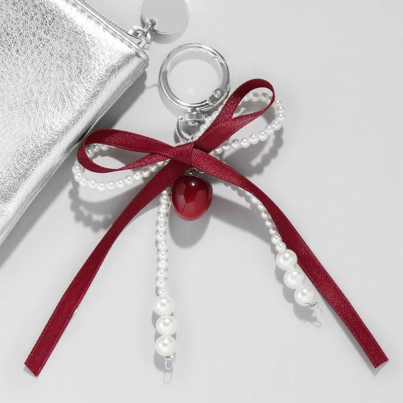 Słodki breloczek z perłą w ksz – Ribbon Bow Gift recenzja i cena